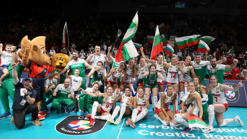 Bulgaria celebrate their victory over Poland with the home crowd