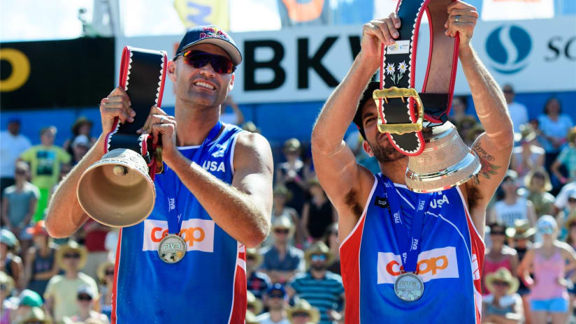 Phil Dalhausser & Nick Lucena of the United States with the cowbells