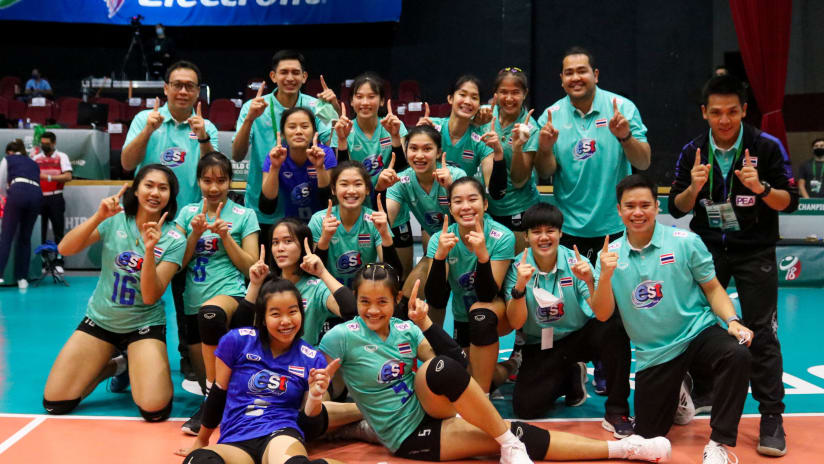 Thai players pose after their victory in the final day of the tournament