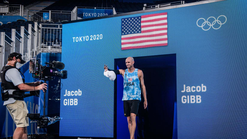 Jake Gibb enters the Olympic stadium one last time