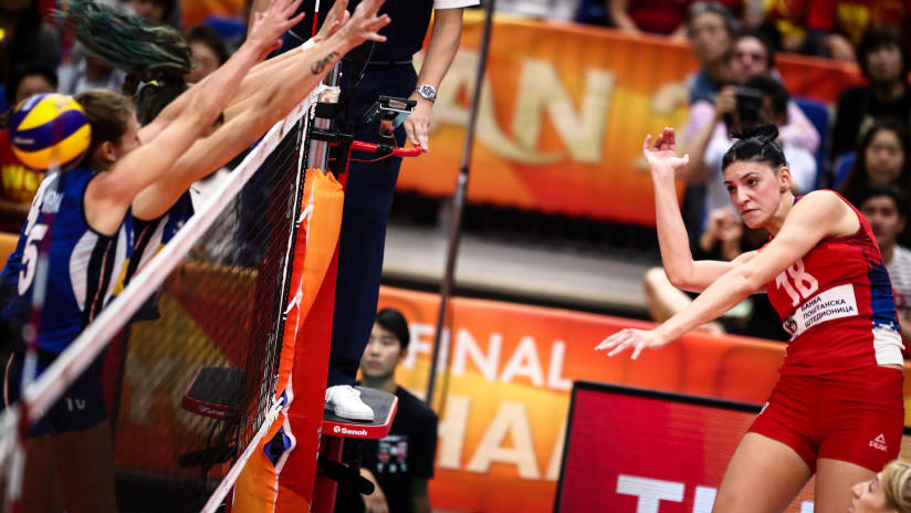MVP-to-be Tijana Boskovic of Serbia spikes against Italy in the 2018 final