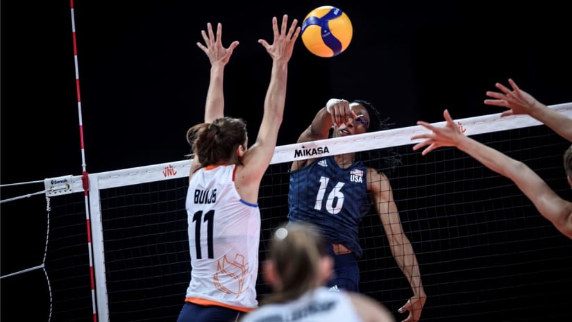 Akinradewo hits during the match against the Netherlands