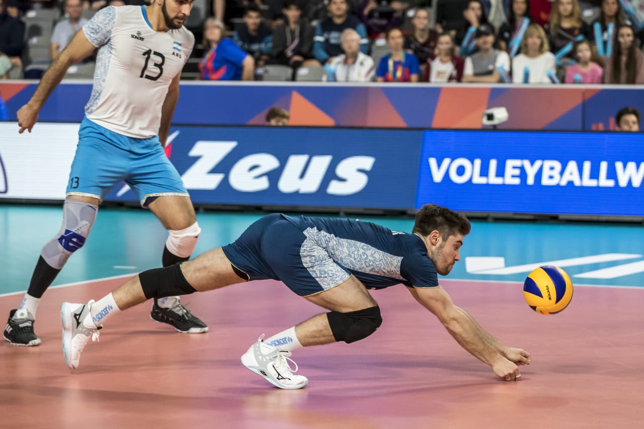 Libero Santiago Danani dives for the dig at the 2019 FIVB Volleyball Nations League.