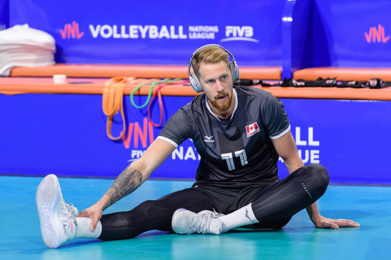 Daniel Vandoorn gets in the zone with a bit of music as he prepares to warm up for the match against China at the 2019 FIVB Volleyball Nations League.