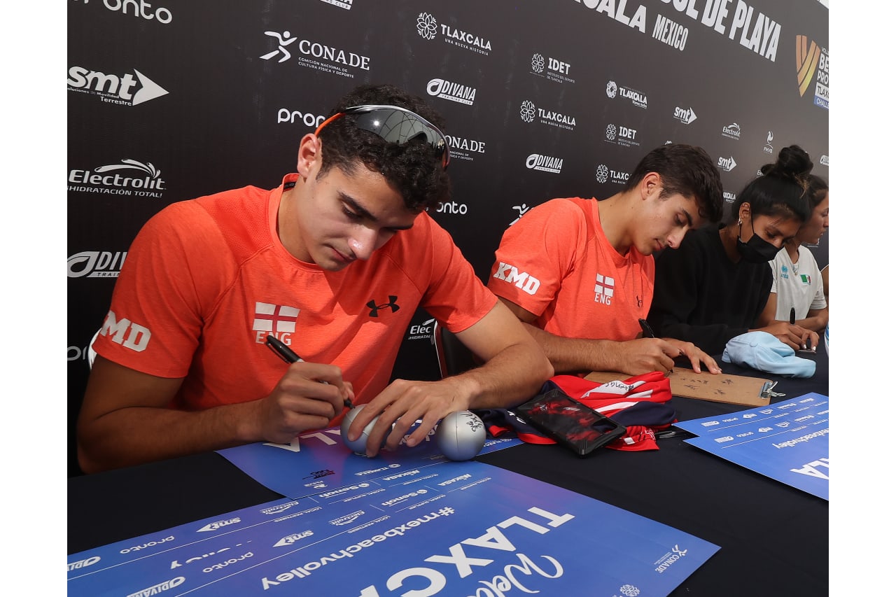English players Javier and Joaquin Bello sign autographs for the fans