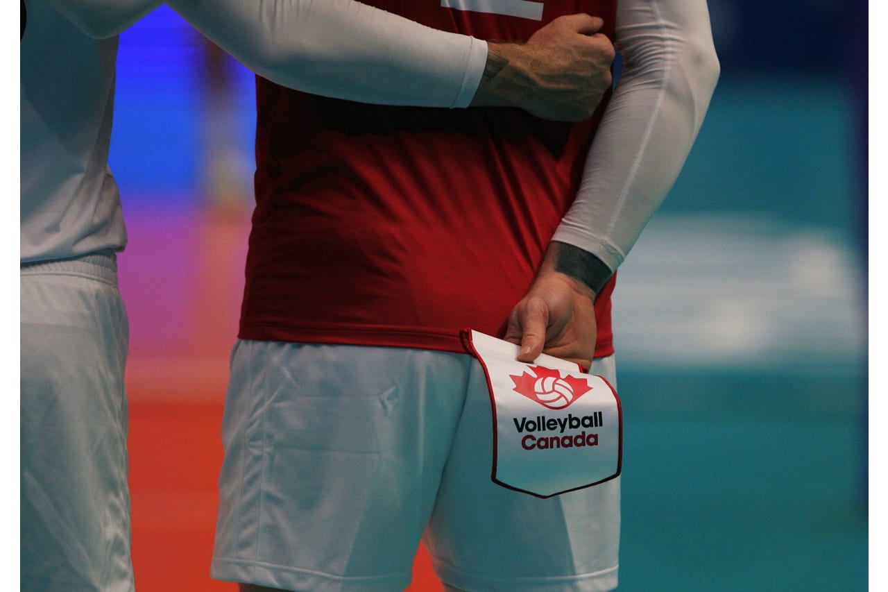 Canada lined up ready to exchange pennants with Portugal in the 2019 FIVB Volleyball Nations League.