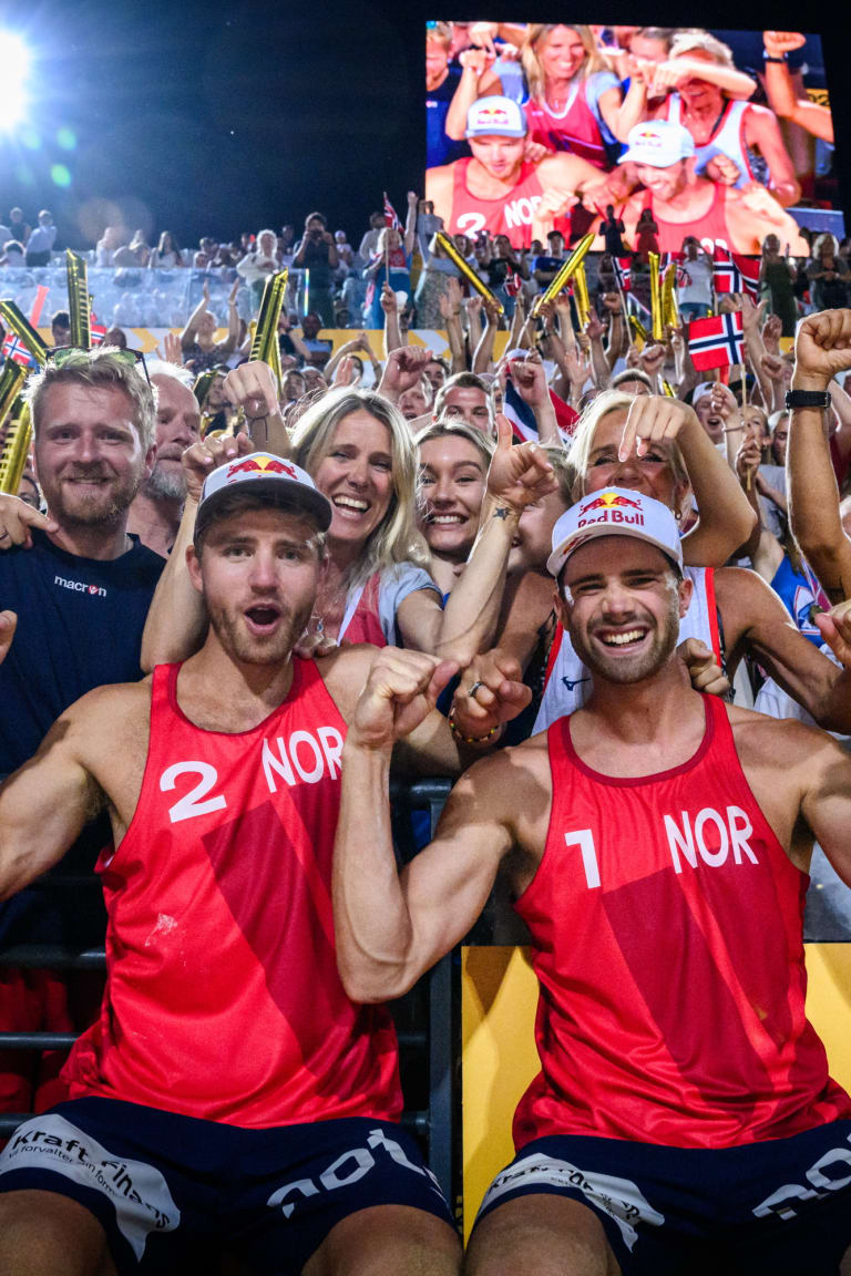 Unstoppable Mol and Sorum lift World Championship trophy