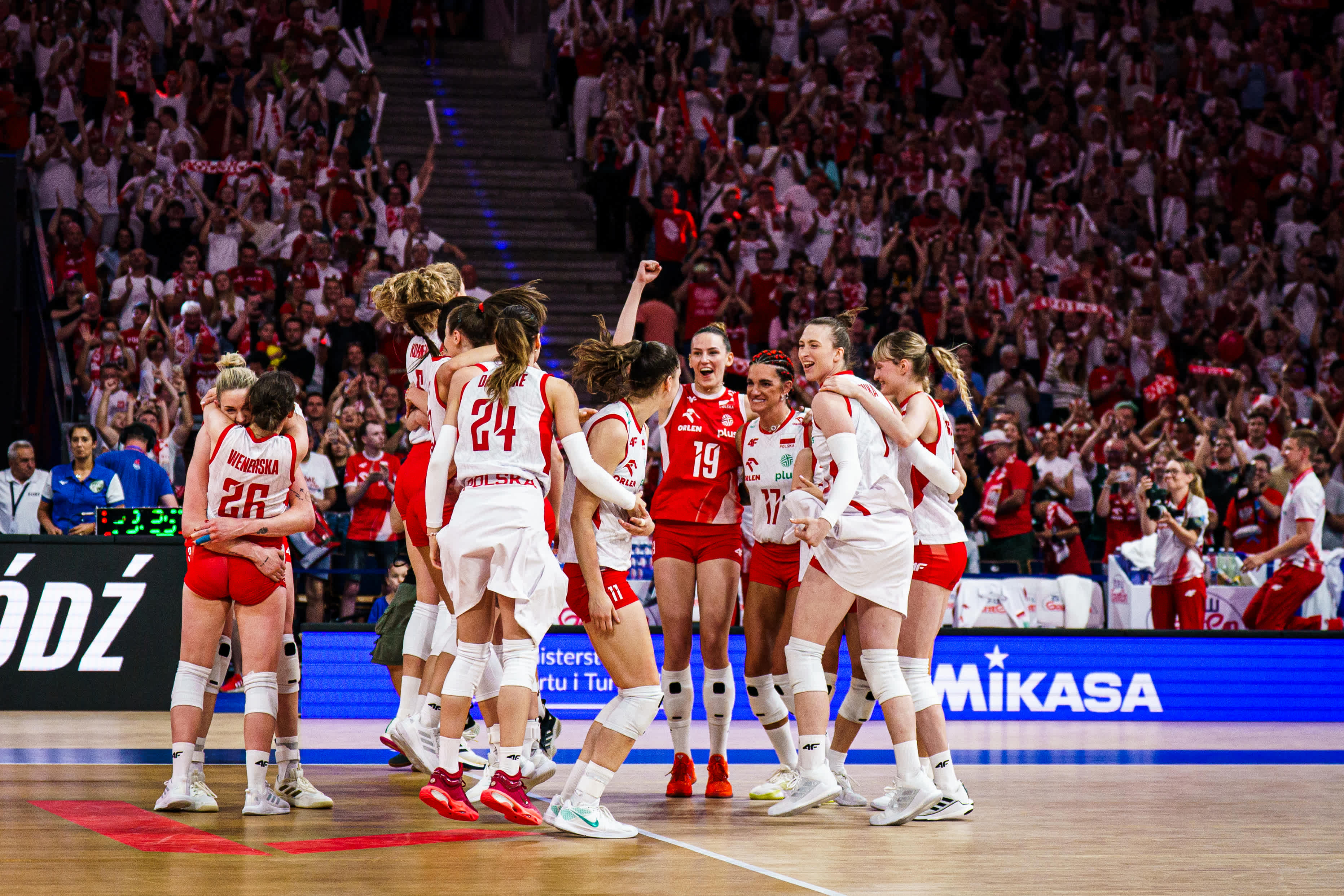 Poland women`s volleyball team celebrating bronze medal.