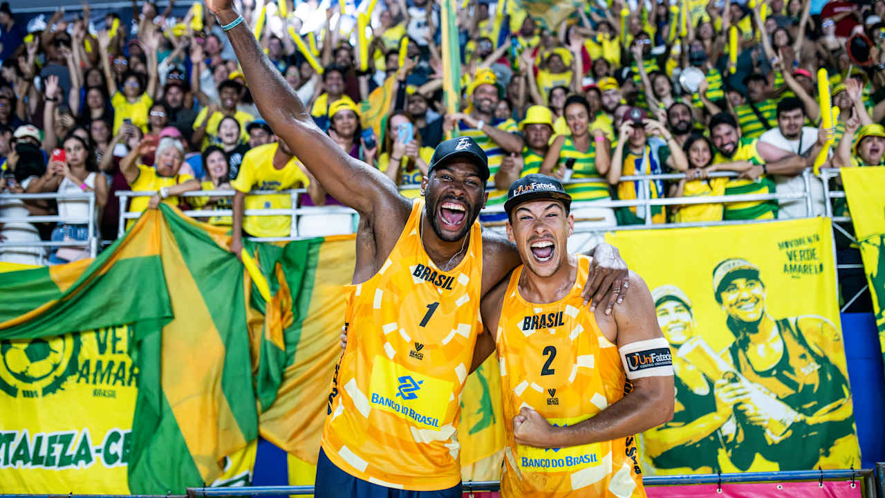 Evandro and Arthur Lanci celebrating gold at Joao Pessoa Elite