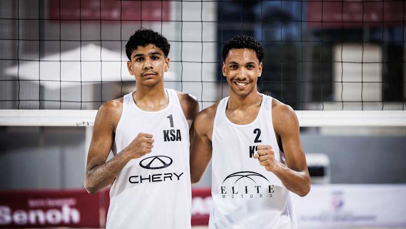 Saudi Arabian beach volleyball players Ahmed Mafouz and Hadi Aljorfi in action
