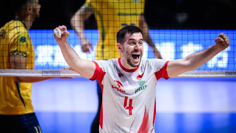 Poland’s playmaker Marcin Komenda celebrates the victory over Brazil
