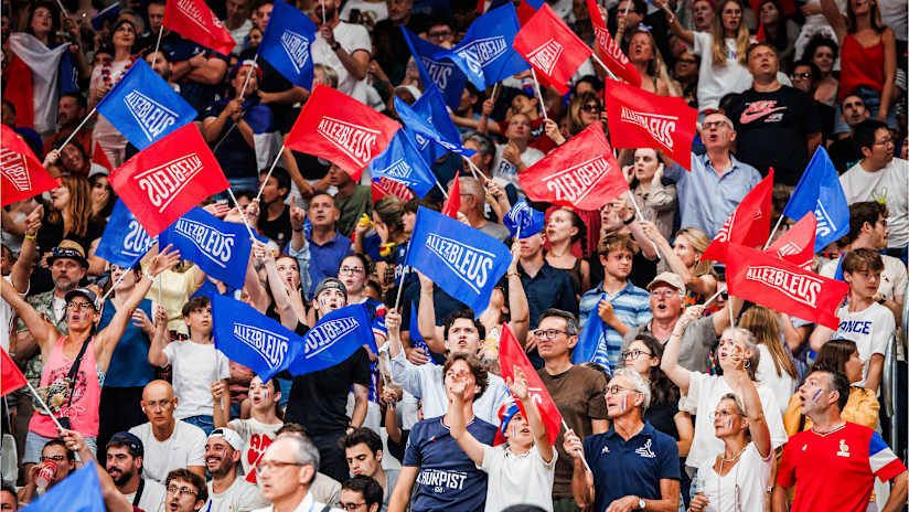 French fans wave their flags during a match at the South Paris Arena 1