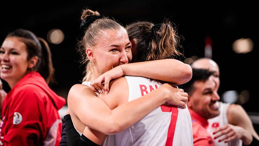 Emotional Turkish players hug after their quarterfinal victory