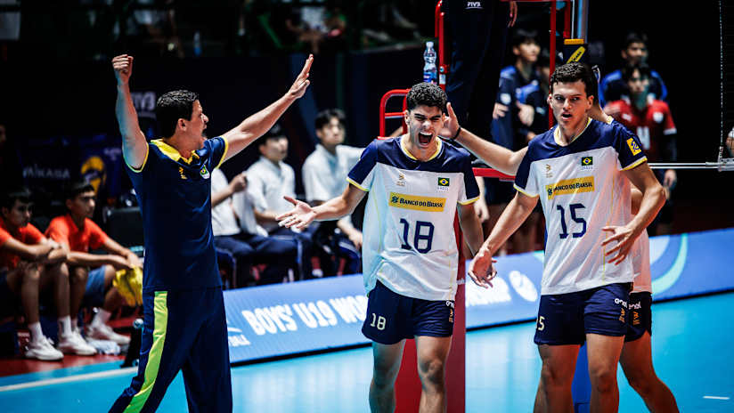 Lucas Rigui celebrating with his volleyball teammates