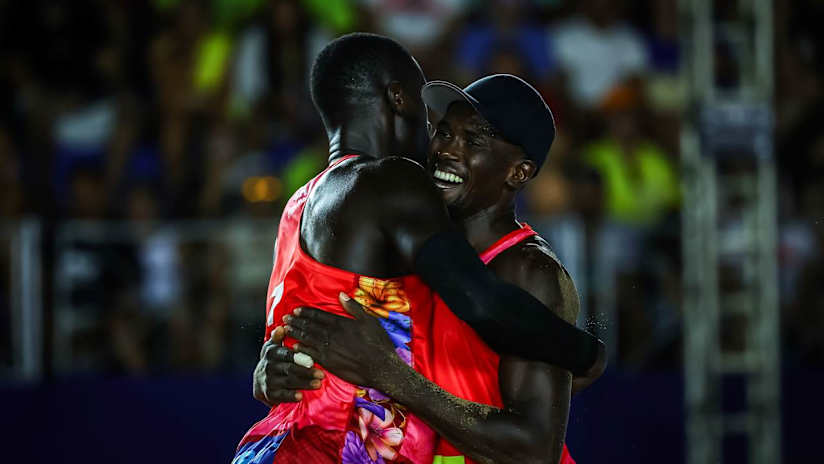 Cherif and Ahmed hug after their quarterfinal victory