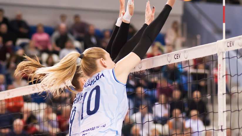 A volleyball player on the volleyball court