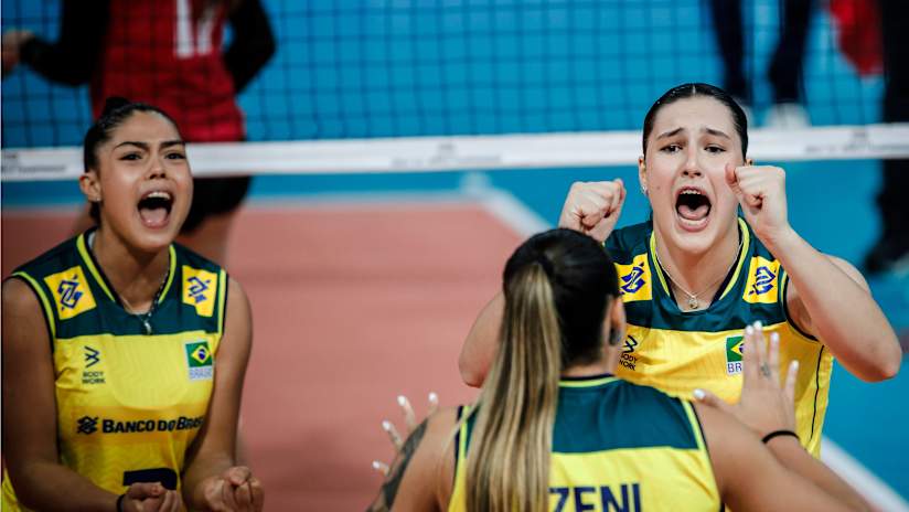 Brazilian players celebrate their third straight-set victory in Lima