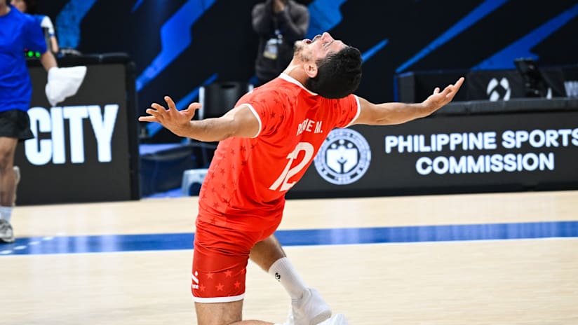 Ecstatic Tunisian libero Mohamed Ridene during the decider against Egypt at the Men’s Volleyball World Championship