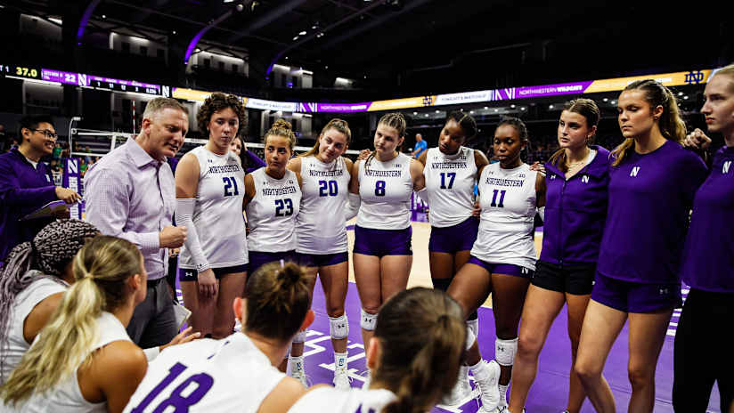 New head coach Tim Nollan talks to the players during a non-conference match (Photo Northwestern Athletics)