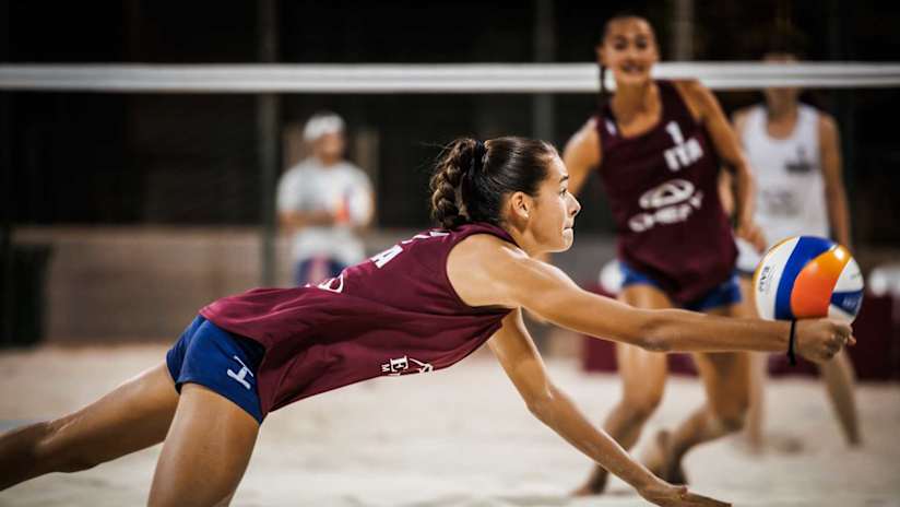Micol Lafuenti jumping for a block