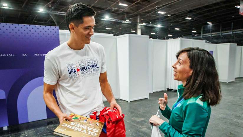 Micah Christenson just before donating his uniform to the Olympic Museum