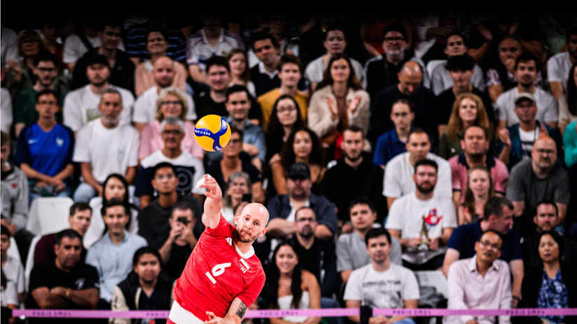 Polish captain Bartosz Kurek serves in front of focused fans at the South Paris Arena 1