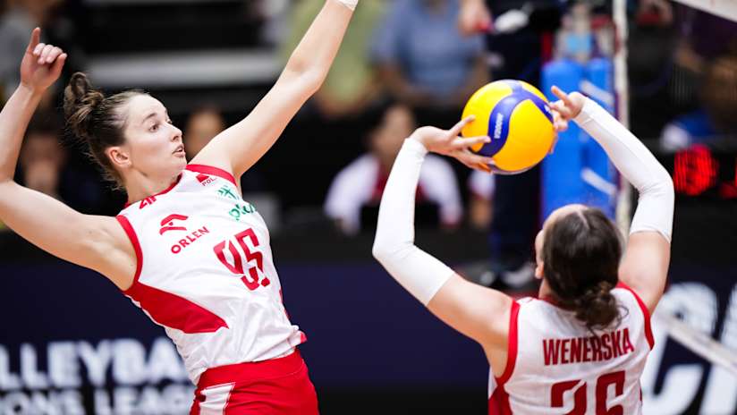 Poland’s middle blocker Magdalena Jurczyk in attack against Korea