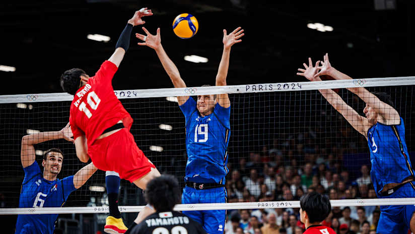 Middle blocker Roberto Russo scored the last two points of the match for Italy