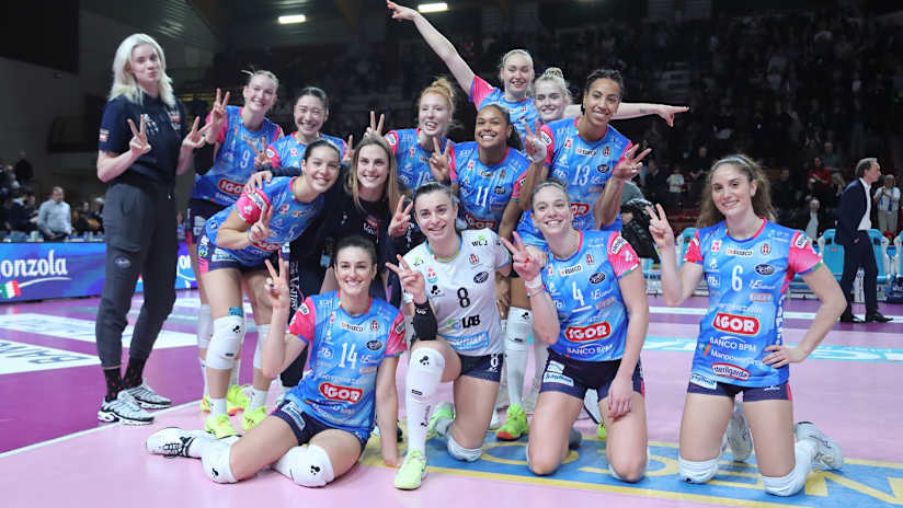 Novara players pose after their victory