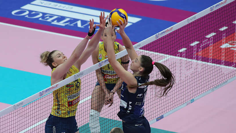 Middle blockers Sarah Fahr and Hena Kurtagić battle at the net during the second match of the series