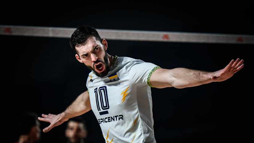 Ukrainian captain Yurii Semeniuk celebrates a point