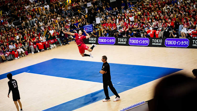 Kento Miyaura of Japan serving against USA