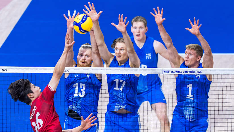 Finnish and Korean men`s volleyball players during Pool C match
