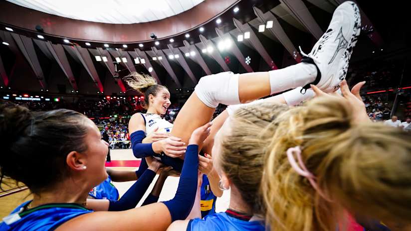 Monica De Gennaro celebrating Italy`s World Championship victory with teammates.
