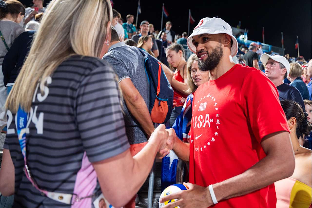 Team USA’s Derrick White and FIVB Athlete Ambassador and two-time Olympian, Louise Bawden at Paris 2024 Beach Volleyball