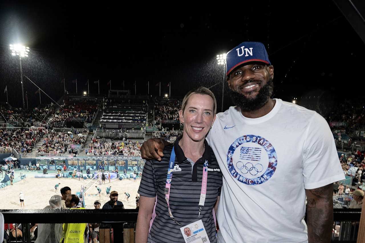 NBA legend LeBron James with FIVB Athlete Ambassador Louise Bawden at Paris 2024 Beach Volleyball