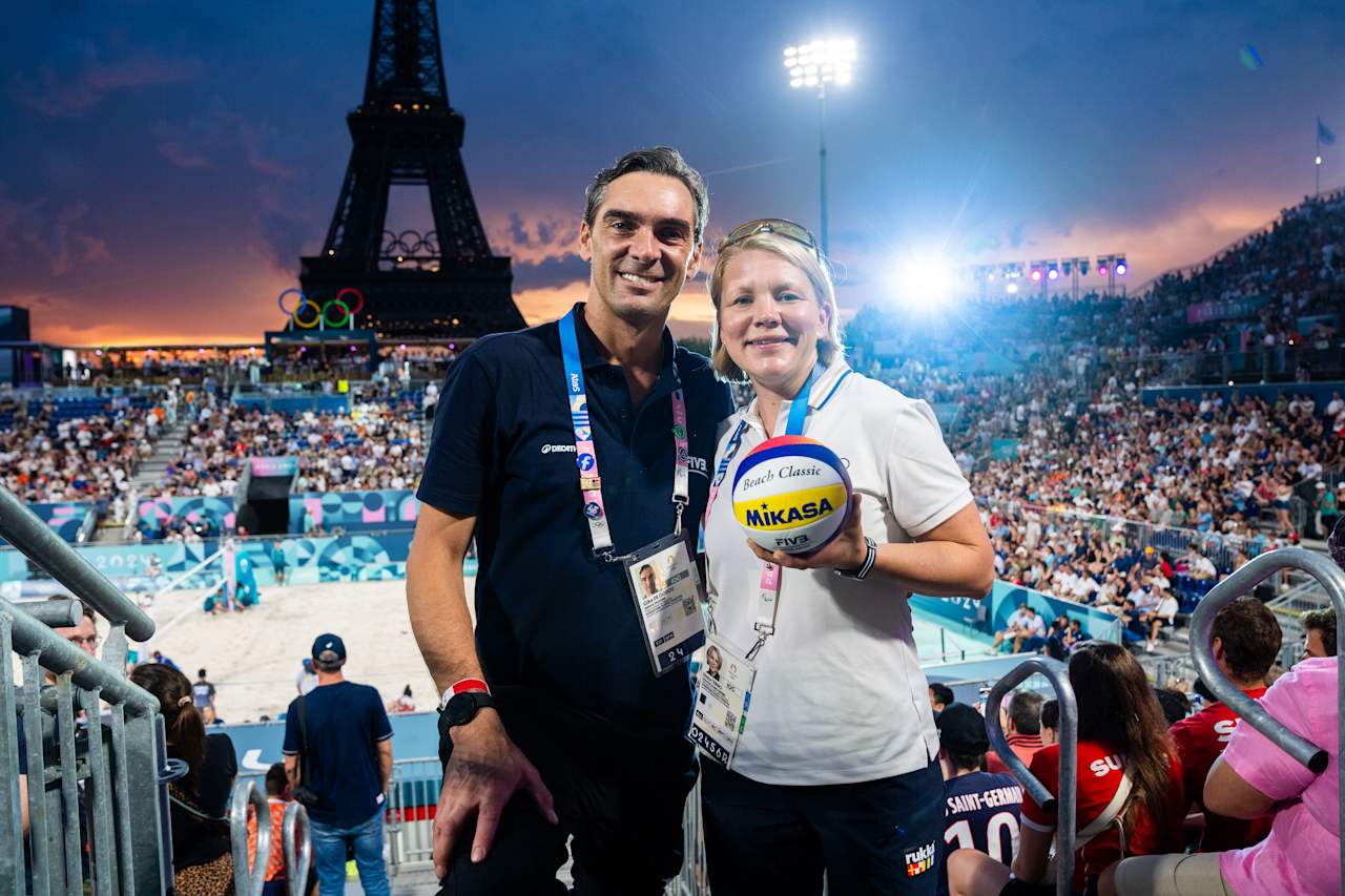 Emma Terho, Chair of the IOC Athletes' Commission and a former ice hockey player from Finland with FIVB Athlete Ambassador Giba at Paris 2024 Beach Volleyball