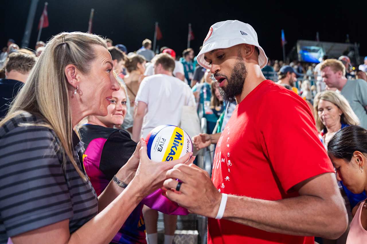 Team USA’s Derrick White and FIVB Athlete Ambassador and two-time Olympian, Louise Bawden at Paris 2024 Beach Volleyball