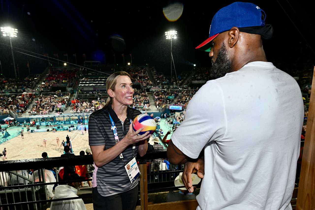 NBA legend LeBron James with FIVB Athlete Ambassador Louise Bawden at Paris 2024 Beach Volleyball