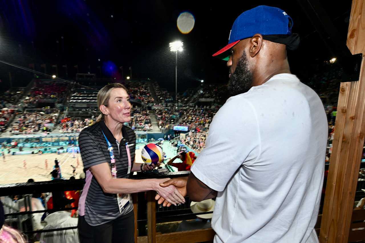 NBA legend LeBron James with FIVB Athlete Ambassador Louise Bawden at Paris 2024 Beach Volleyball