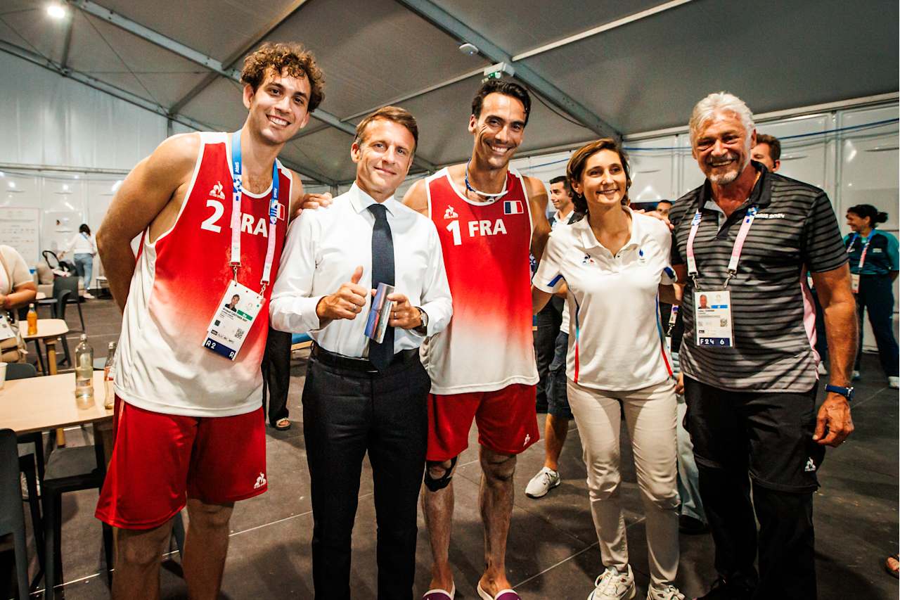 President of France, Emmanuel Macron together with Gauthier-Rat, Krou, Sports Minister Oudea-Castera and CSV President Tullio Teixeira at Paris 2024 Beach Volleyball