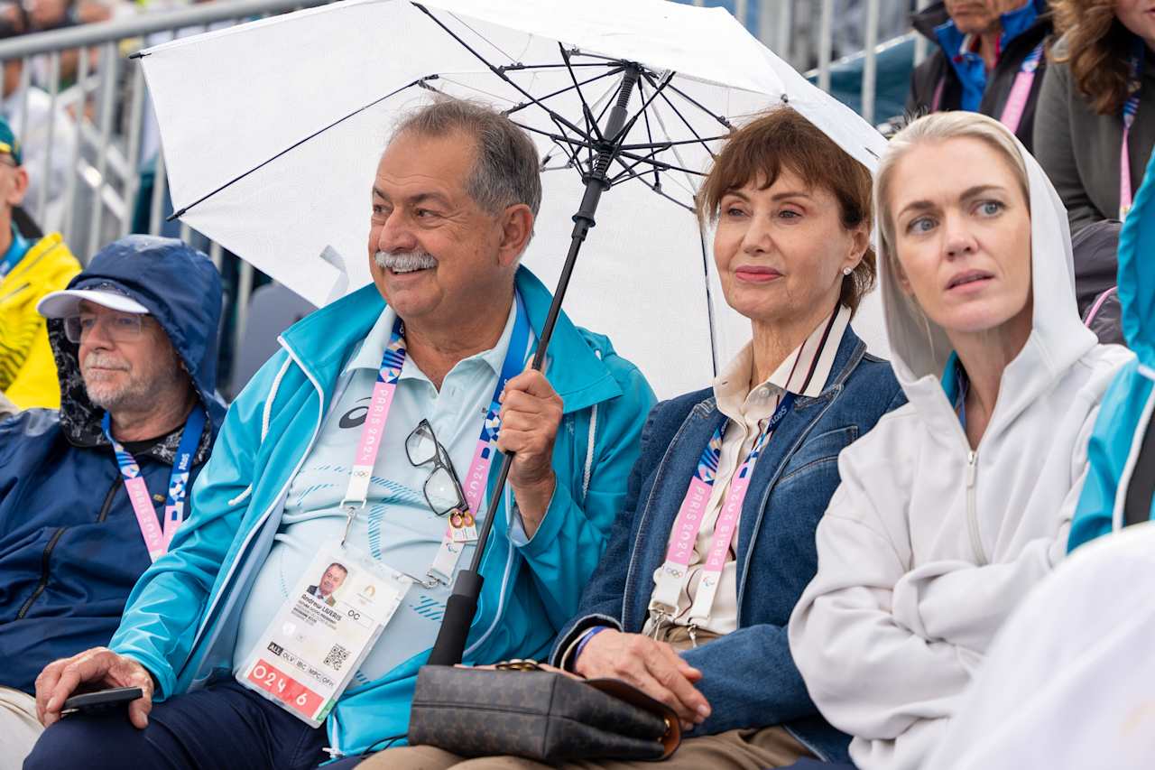 Brisbane 2032 Organising Committee President Andrew Liveris (middle) at Paris 2024 Beach Volleyball