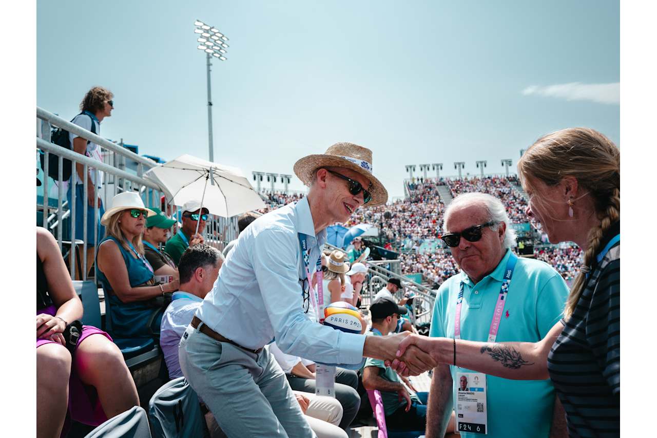 Franck Riester, the Minister Delegate for Foreign Trade and Economic Attractiveness of France together with FIVB Athlete Ambassador and Athletes’ Commission President Madelein Meppelink and Vicente Araujo, President of the Portuguese Volleyball Federation at Paris 2024 Beach Volleyball